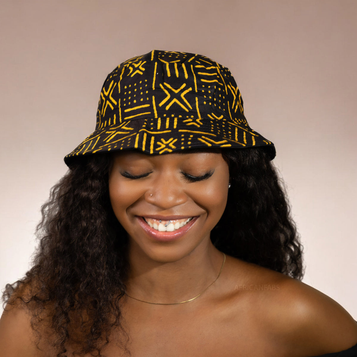 Bucket hat / Fisherman hat with African print - Black / yellow