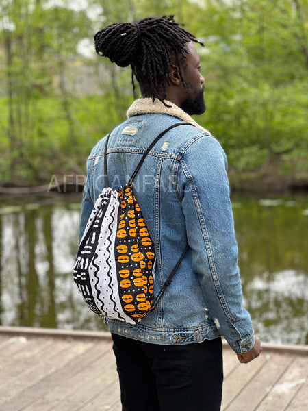 African Print Drawstring Bag / Gym Sack / School bag / Ankara Backpack / Festival Bag - White / orange bogolan