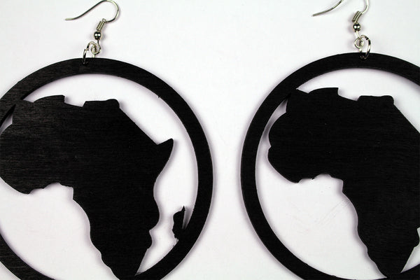 Black African continent in wooden circle